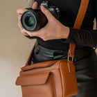 Compacte camera schoudertas voor reizen en city trips