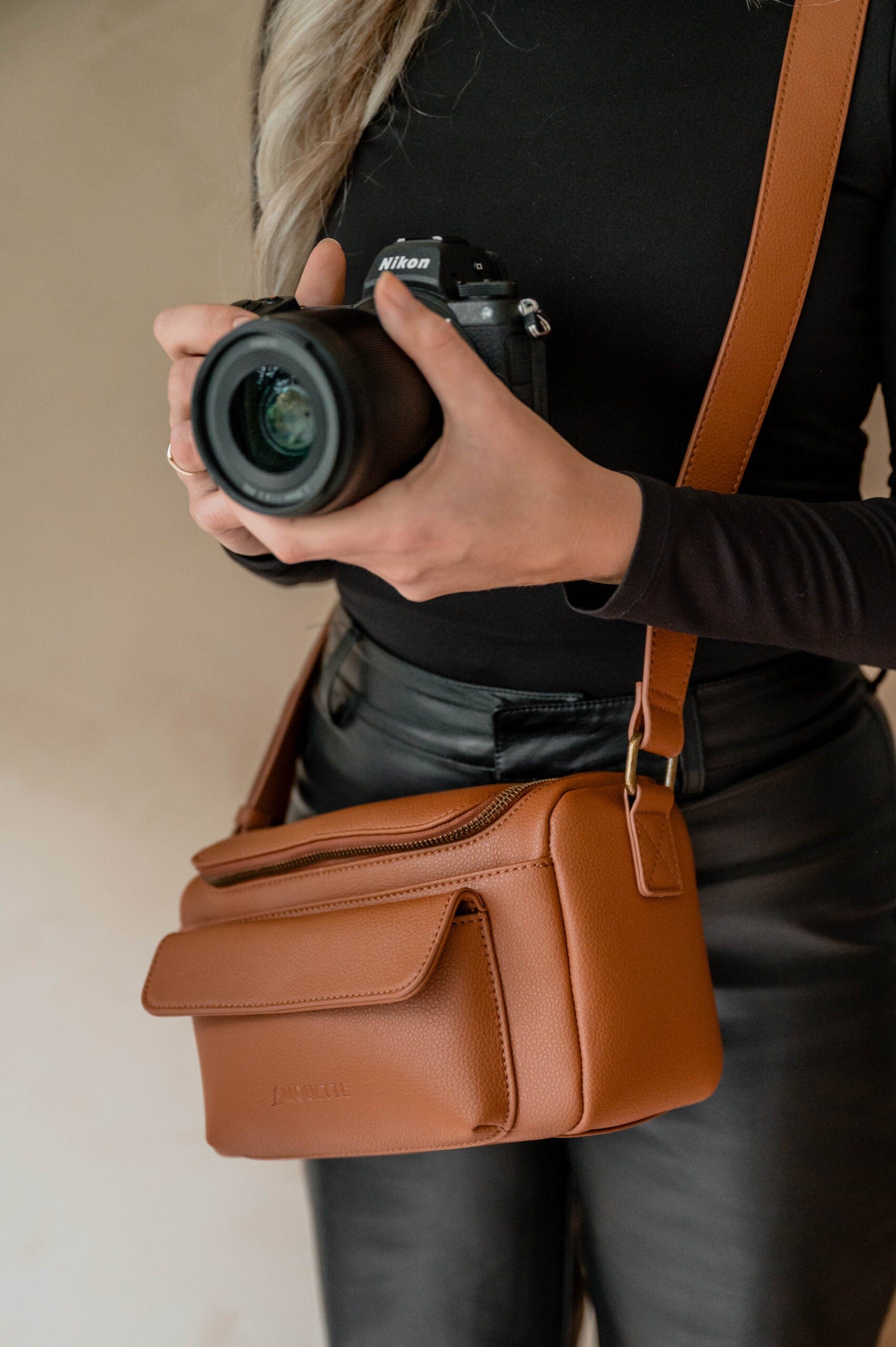 Compacte camera schoudertas voor reizen en city trips